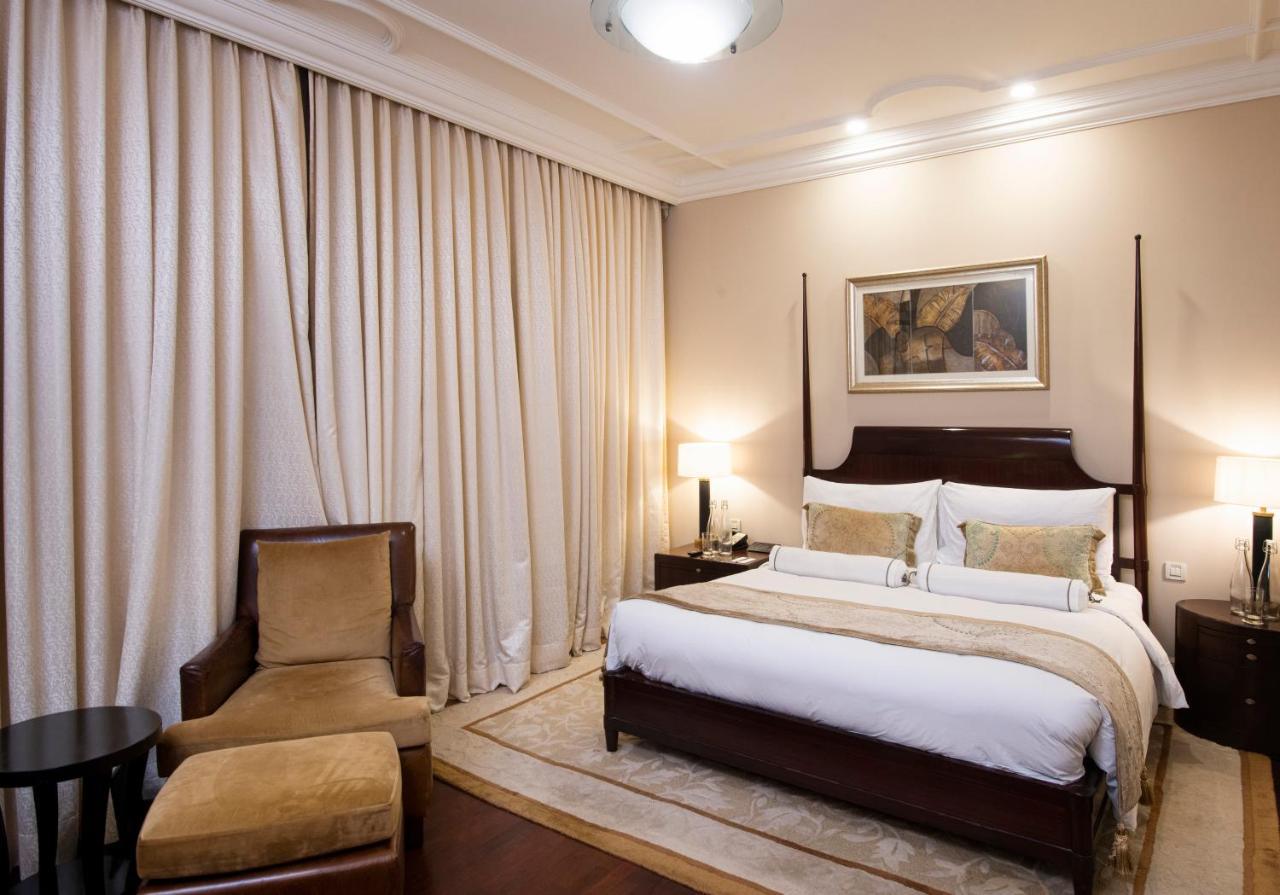 The Claridges New Delhi Hotel Exterior photo A bedroom at the Taj Mahal Palace