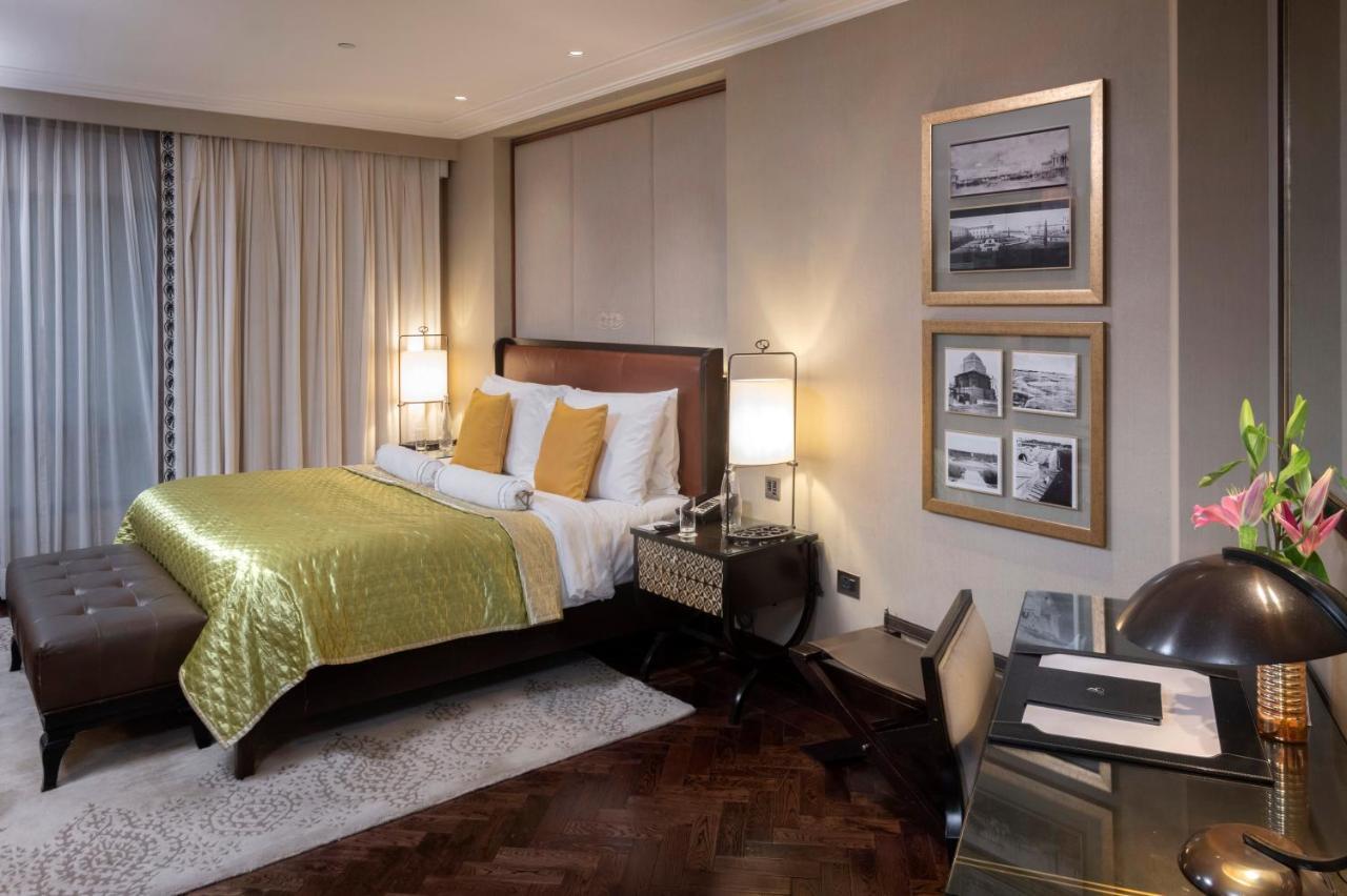 The Claridges New Delhi Hotel Exterior photo A bedroom in the hotel