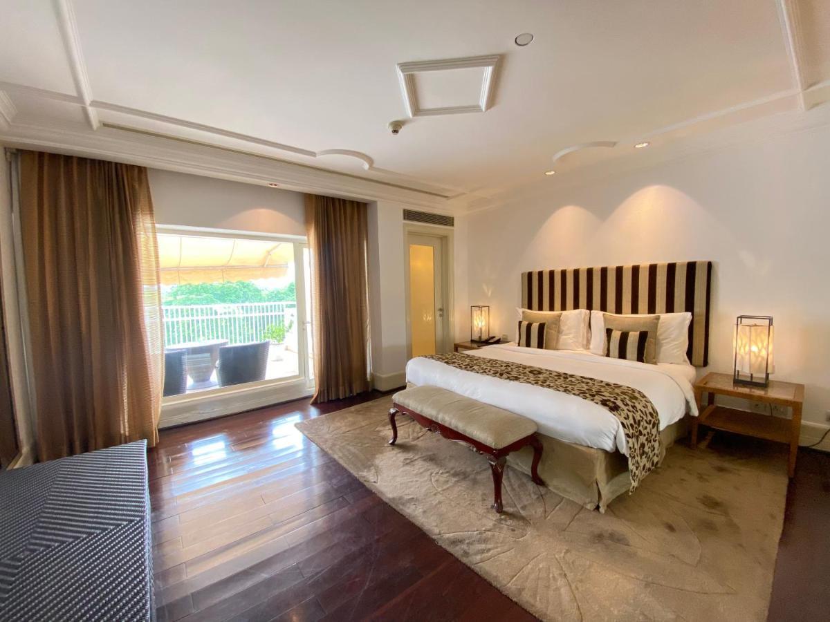 The Claridges New Delhi Hotel Exterior photo A bedroom at the Taj Mahal Palace