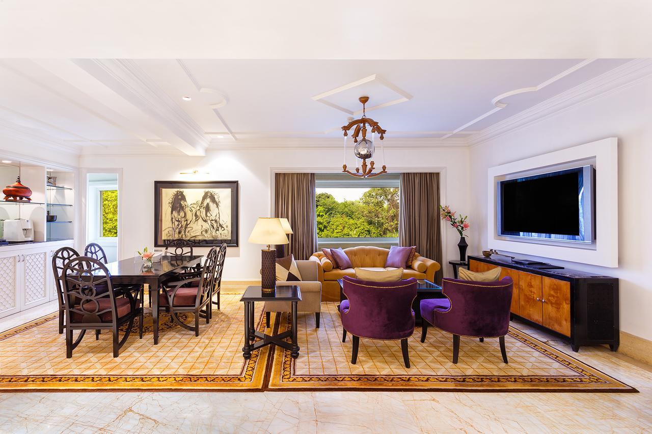 The Claridges New Delhi Hotel Exterior photo A living room in a suite at the Four Seasons Hotel, Mumbai